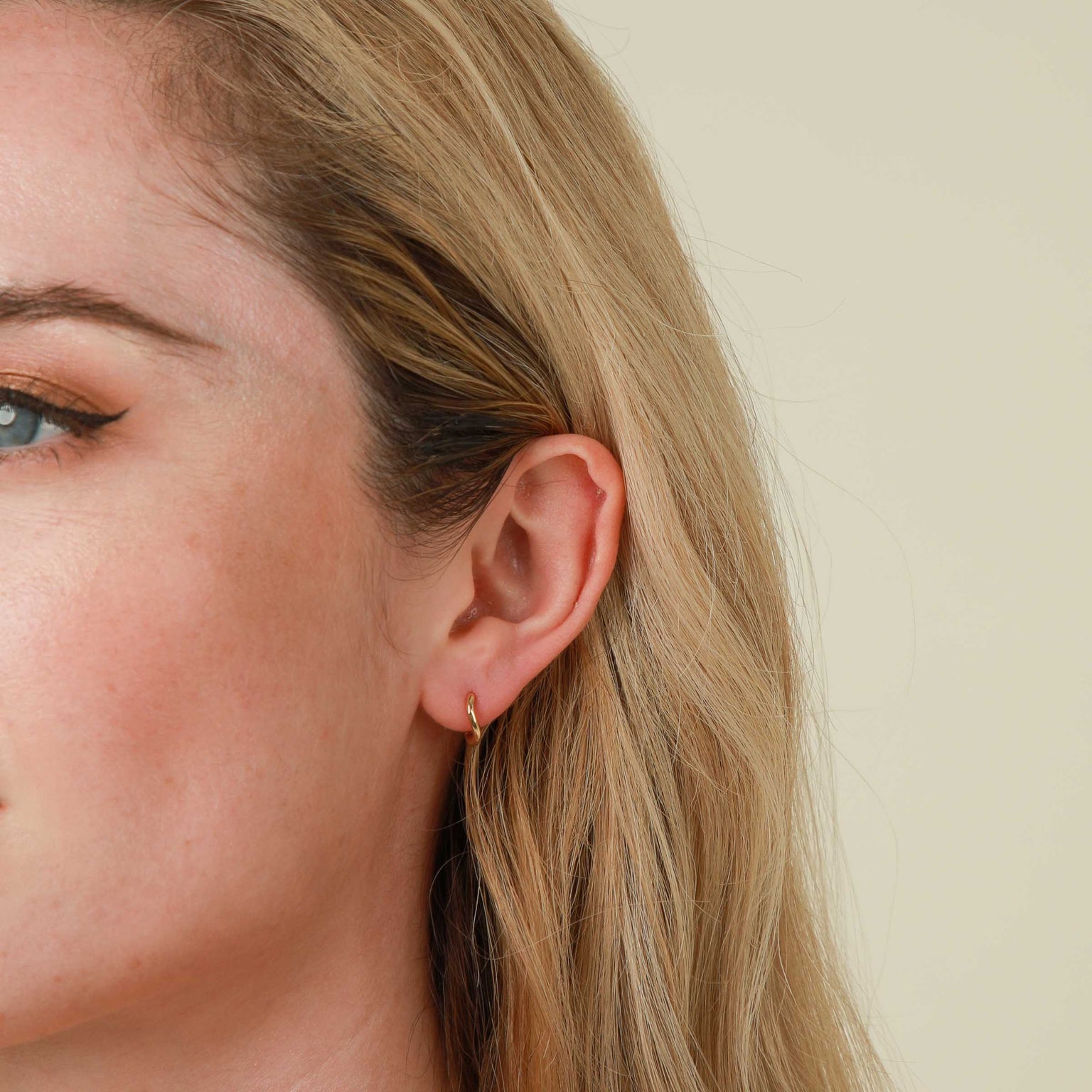 Wave Huggies in Gold worn