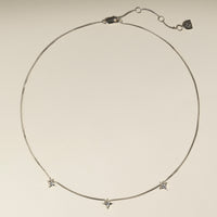 Cosmic Star Charm Necklace in Silver