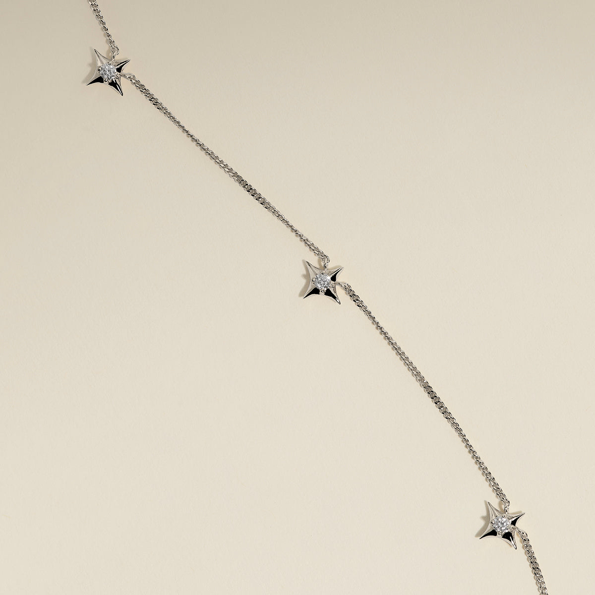 Cosmic Star Charm Necklace in Silver
