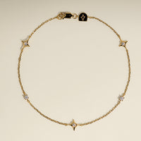 Cosmic Star Charm Bracelet in Gold