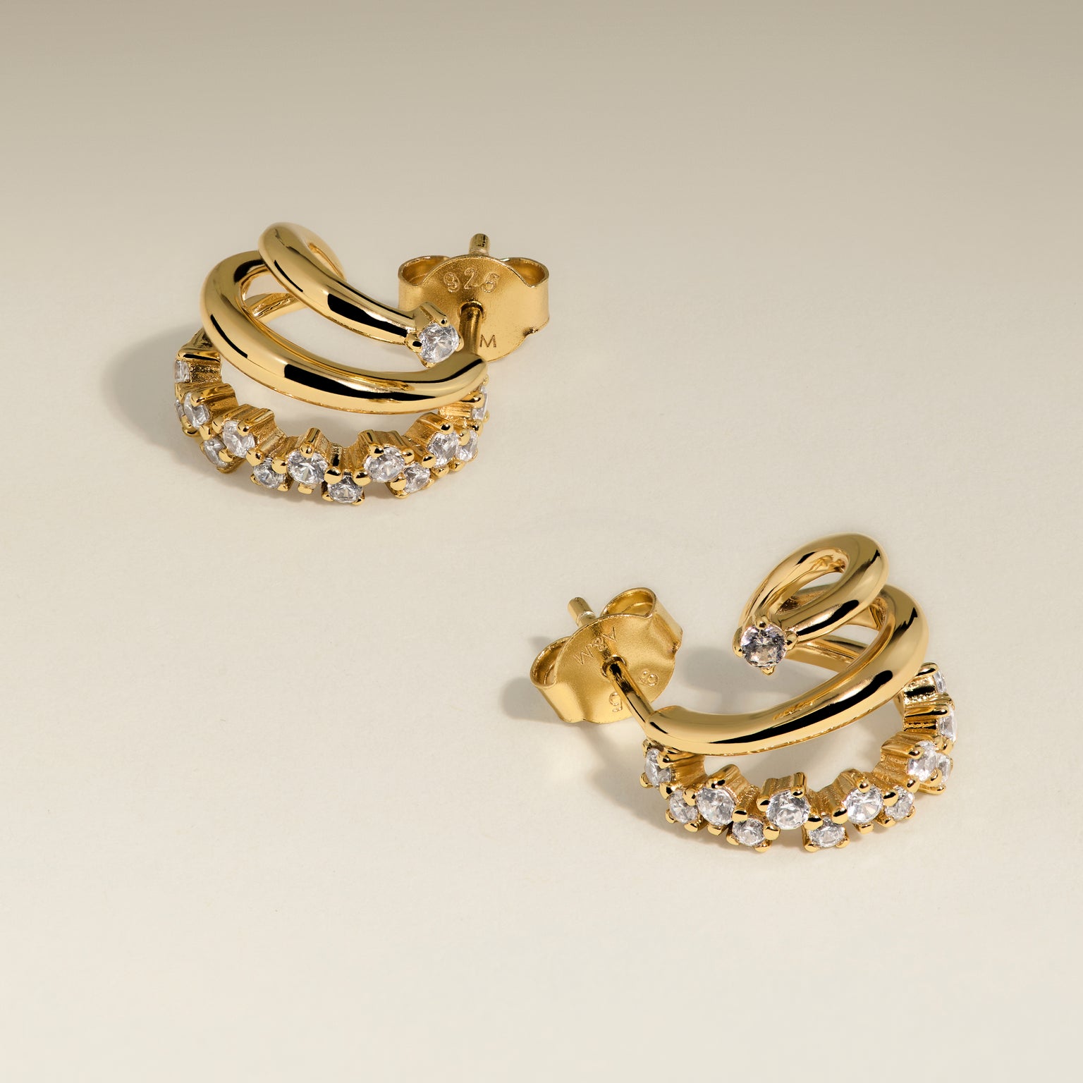Illusion Spiral Huggies in Gold-Astrid &amp; Miyu