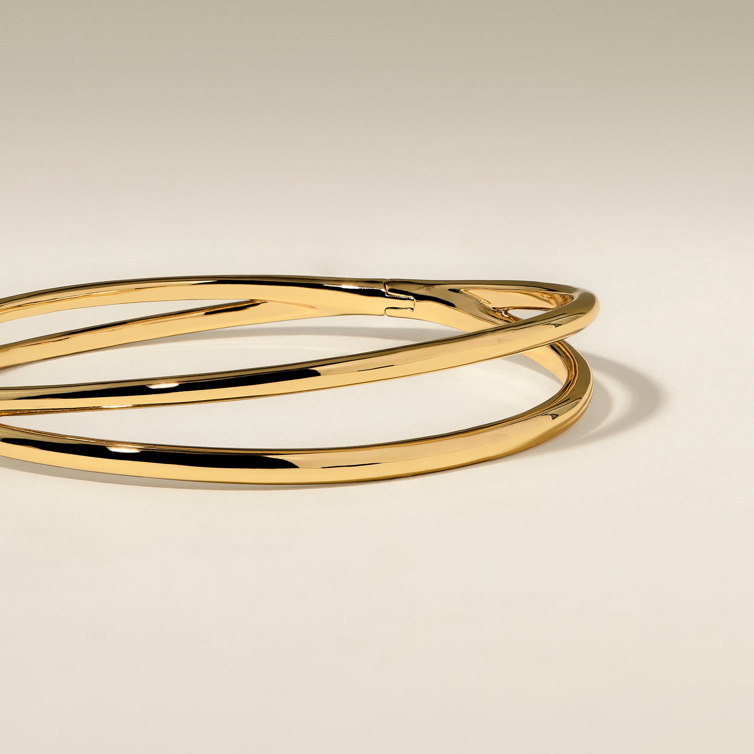 Crossover Illusion Bangle in Gold-Astrid &amp; Miyu