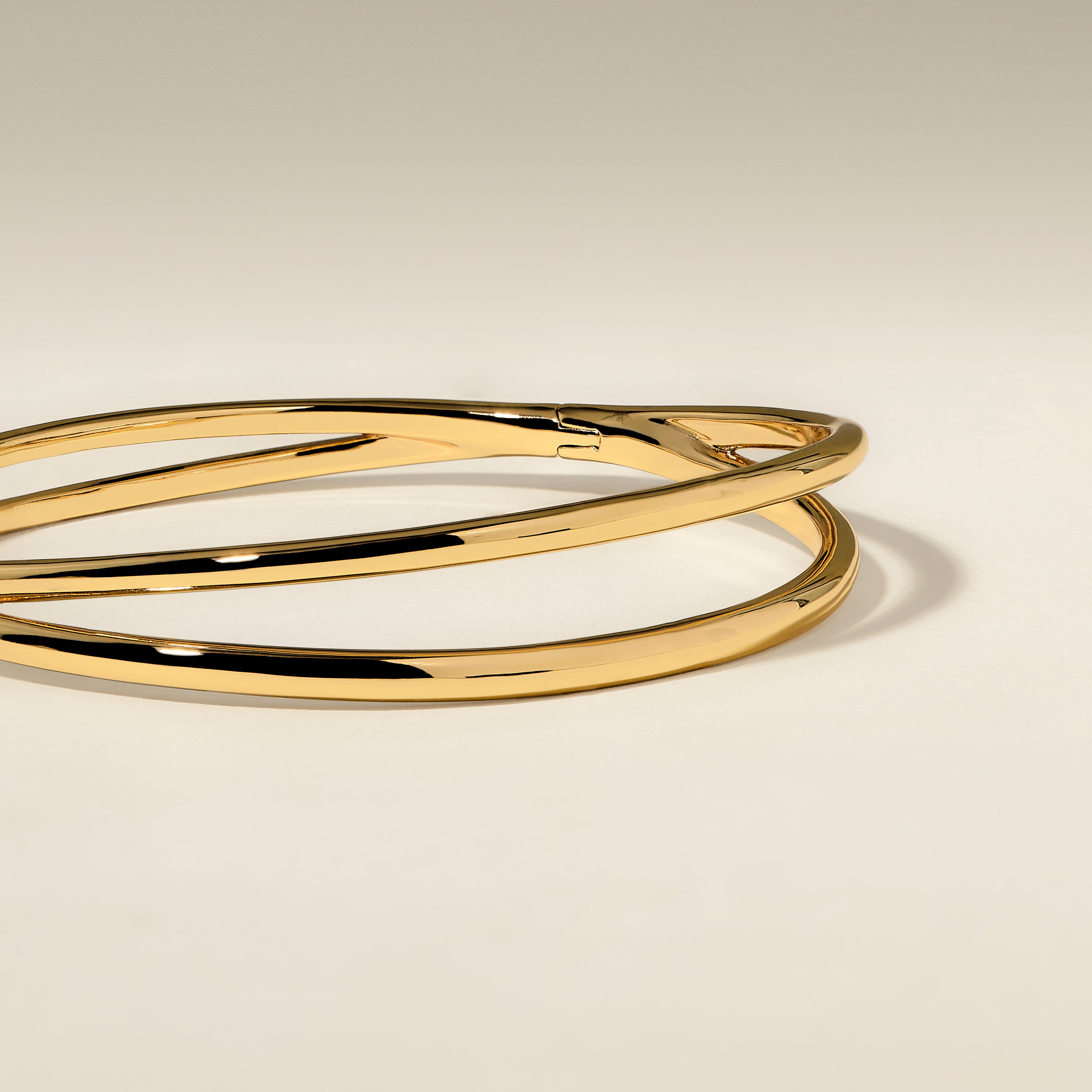 Crossover Illusion Bangle in Gold-Astrid &amp; Miyu