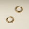 Crystal Cosmic Twist Medium Hoops in Gold-Astrid &amp; Miyu