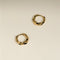 Cosmic Twist Huggies in Gold-Astrid &amp; Miyu