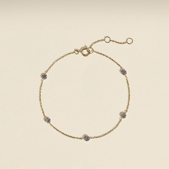 Floating Diamond Charm Bracelet in Solid Gold