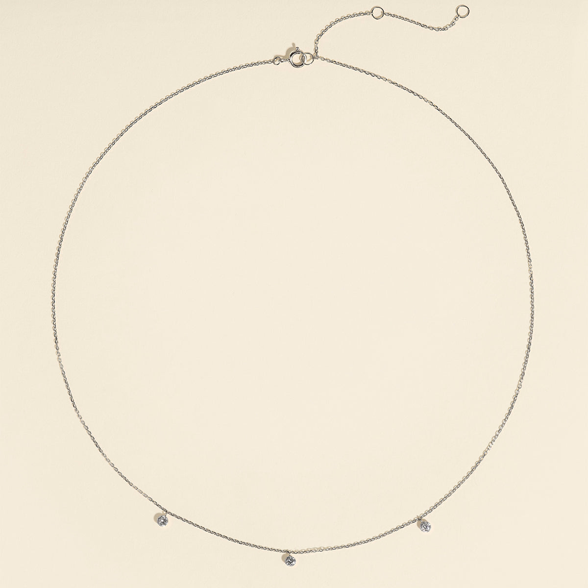 Floating Diamond Charm Bracelet in Solid White Gold