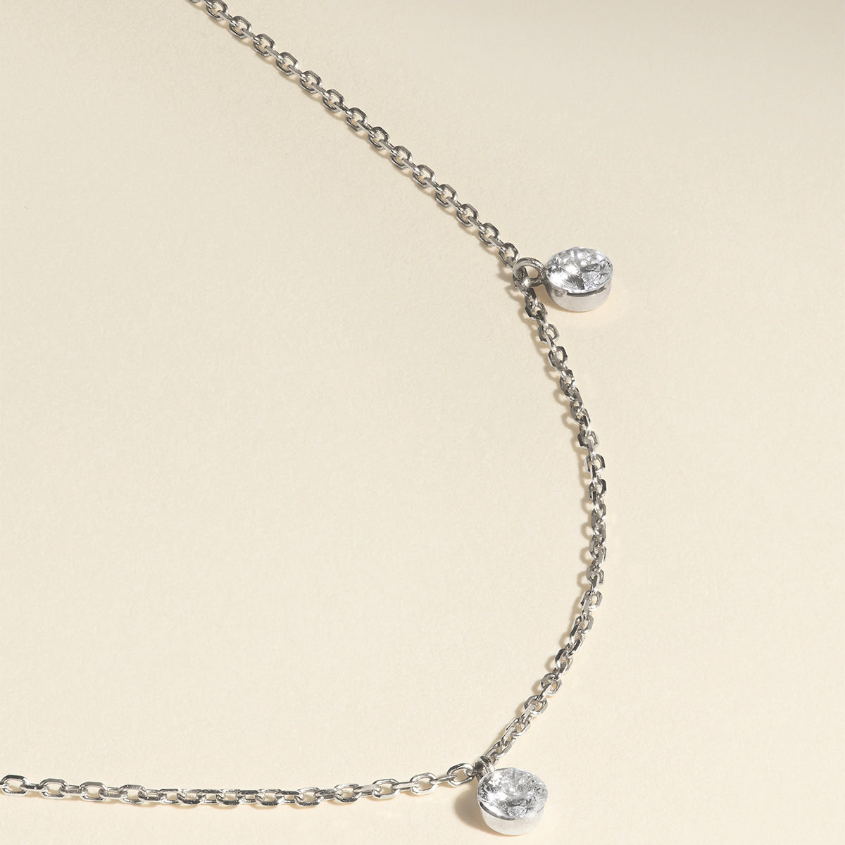 Floating Diamond Charm Bracelet in Solid White Gold