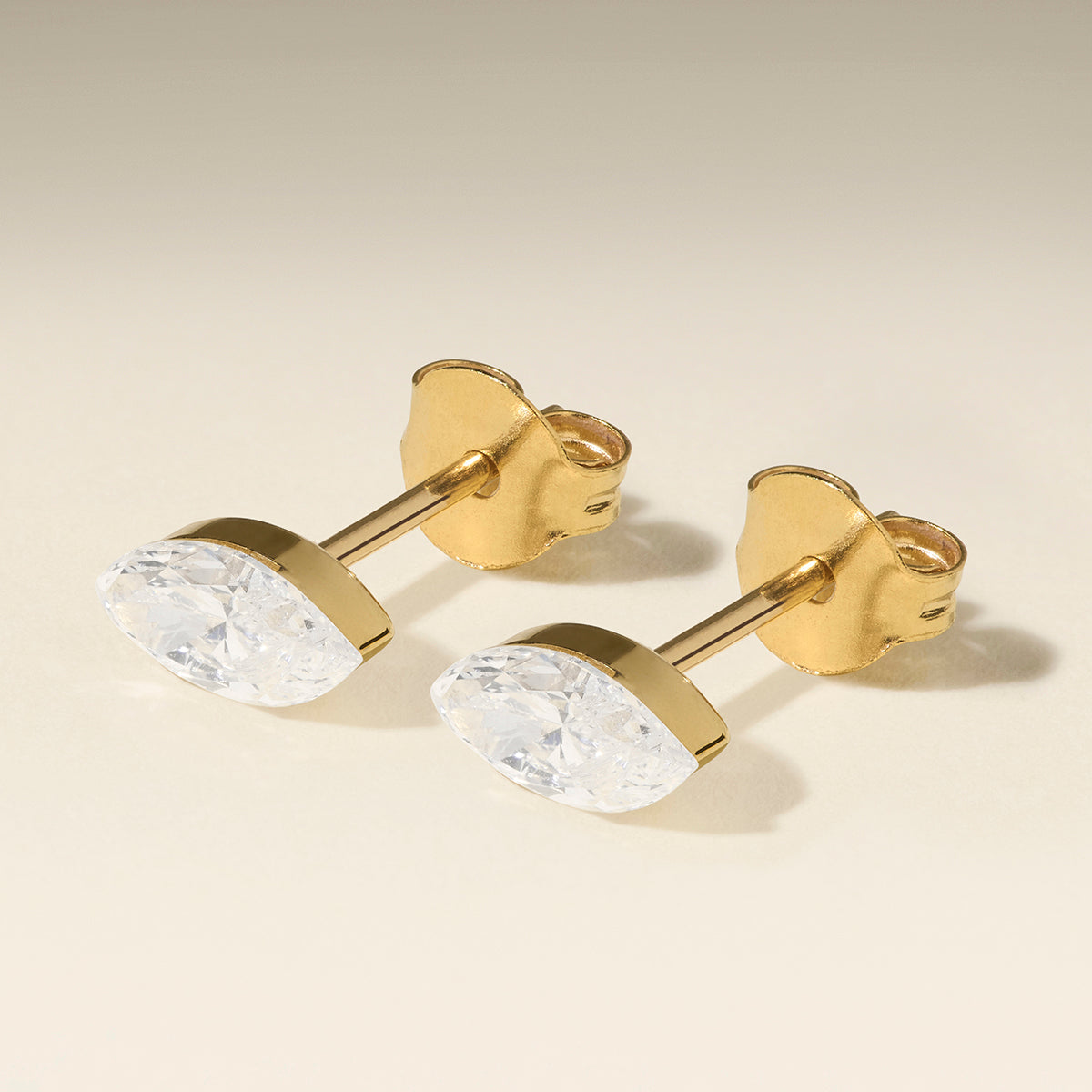 Floating Marquise Diamond Stud Earrings in Solid Gold