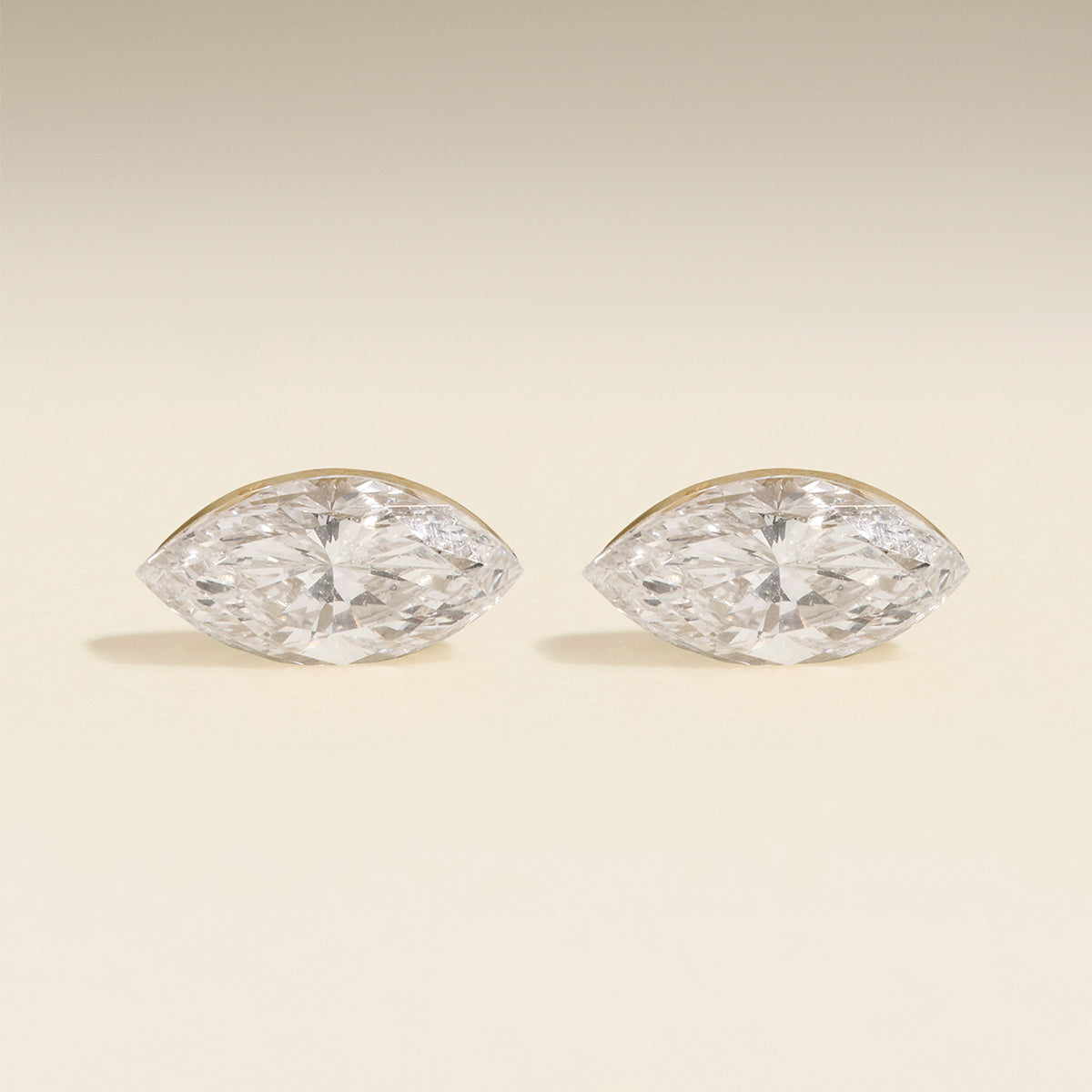 Floating Marquise Diamond Stud Earrings in Solid Gold