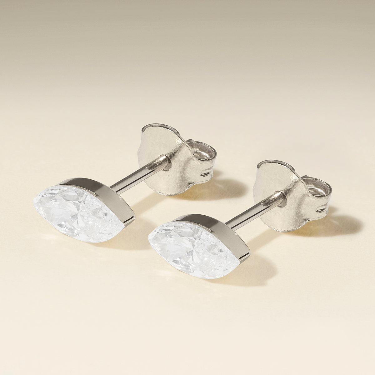 Floating Marquise Diamond Stud Earrings in Solid White Gold