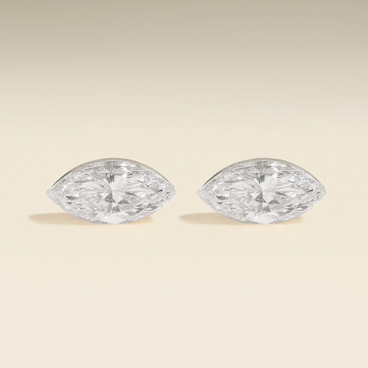 Floating Marquise Diamond Stud Earrings in Solid White Gold