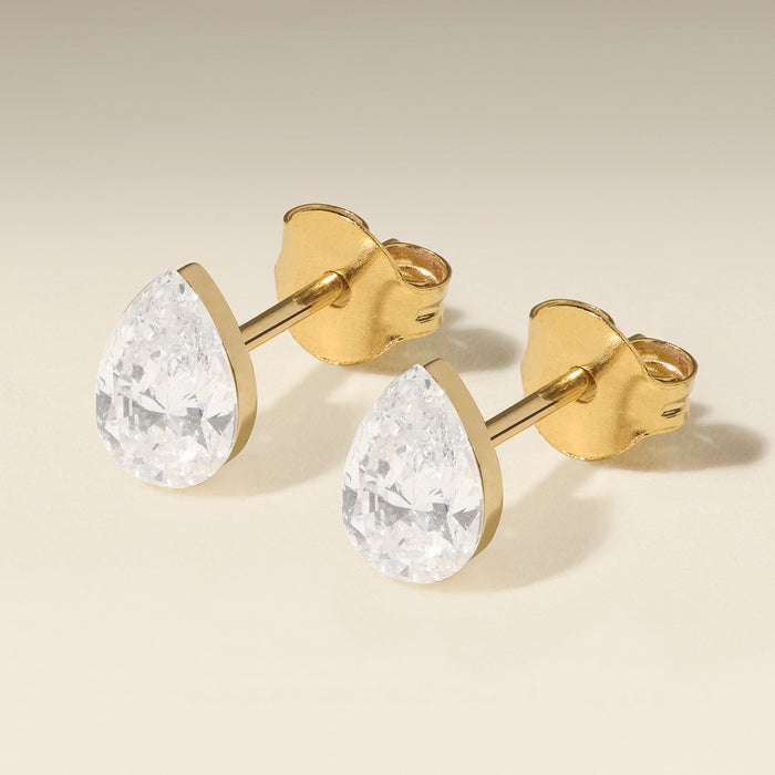 Floating Pear Diamond Stud Earrings in Solid Gold