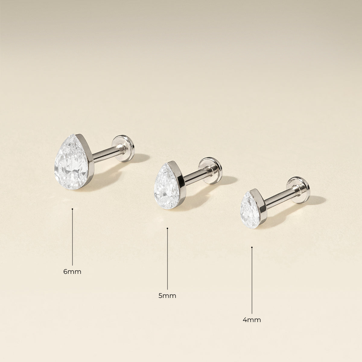 Floating Pear Diamond Piercing Stud in Solid White Gold
