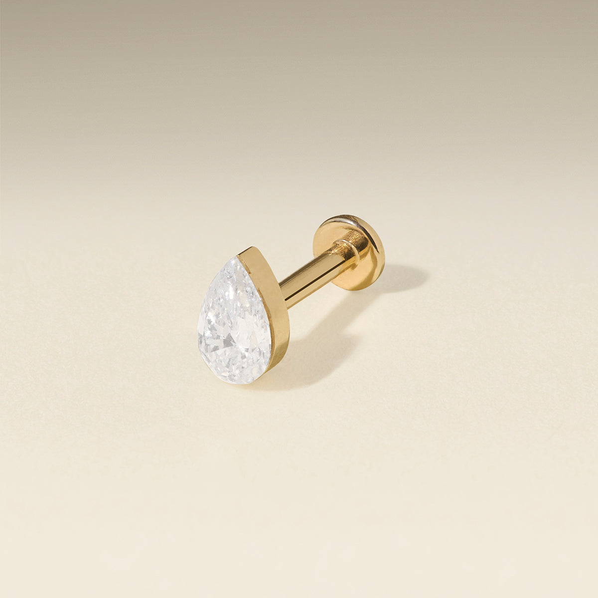 Floating Pear Diamond Piercing Stud in Solid Gold