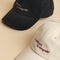 Mercury in Retrograde Cap in Dark Blue-Astrid &amp; Miyu