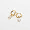 Serenity Pearl Charm Hoops in Gold flat lay