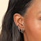 Cosmic Star 6.5mm Hoop in Silver worn layered with other earrings