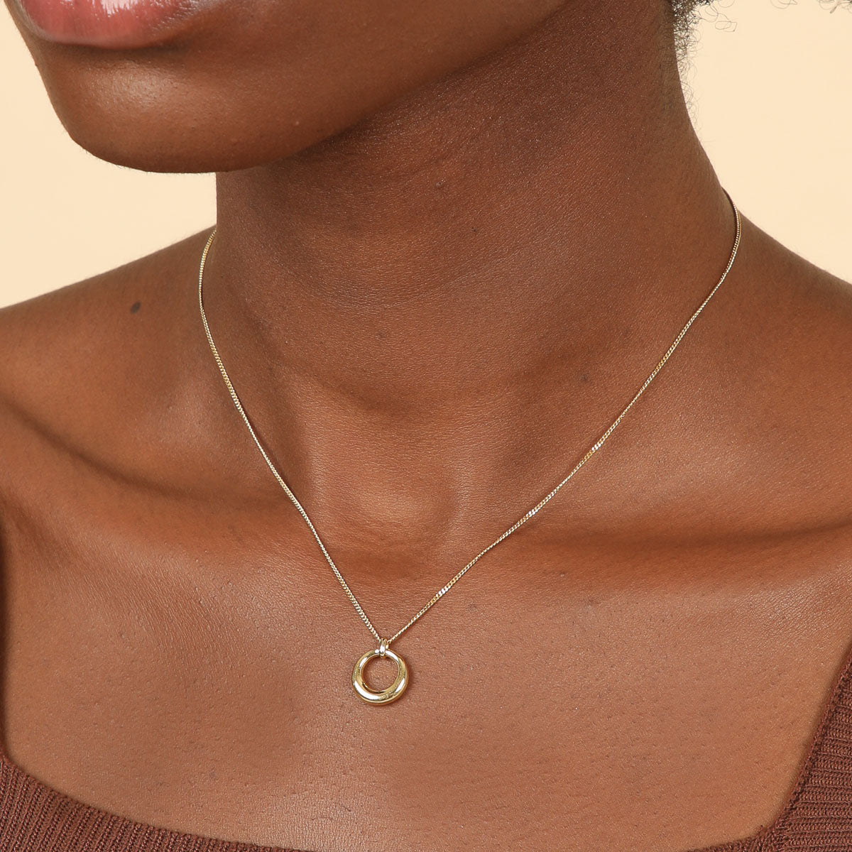 Bold Halo Pendant Necklace in Gold worn