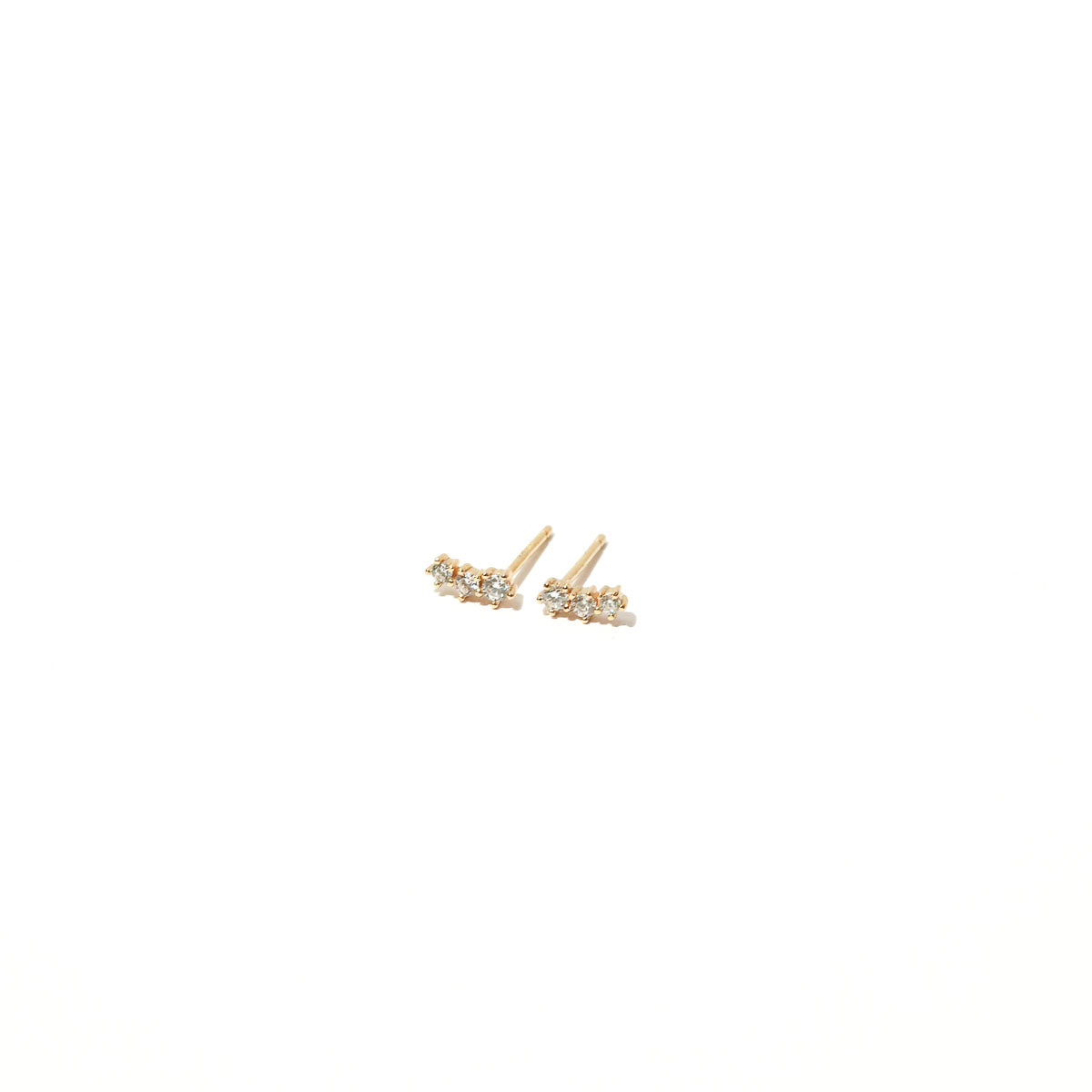 Glimmer Crystal Climber Stud Earrings in Gold flat lay