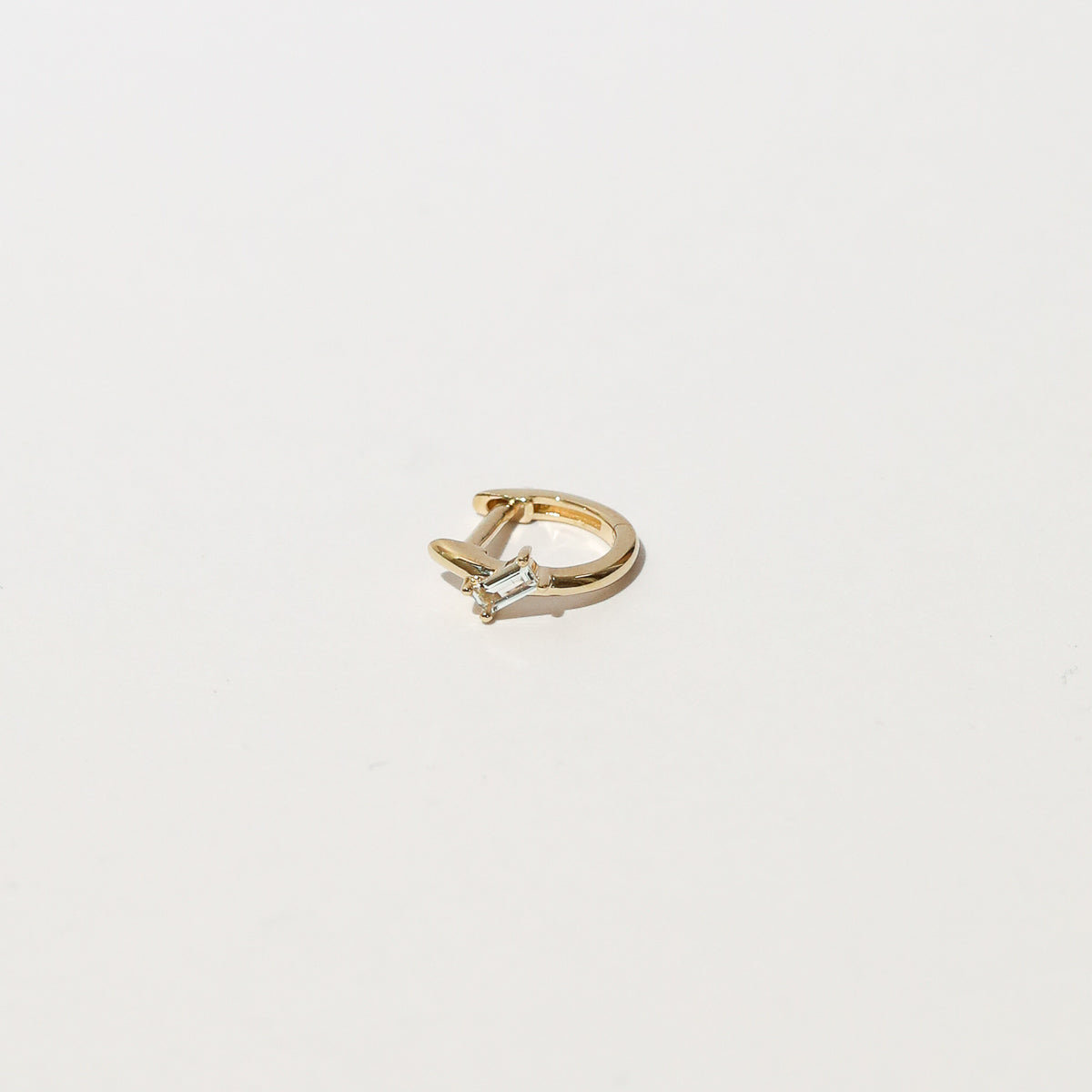 Baguette Piercing Hoop in Solid Gold flat lay
