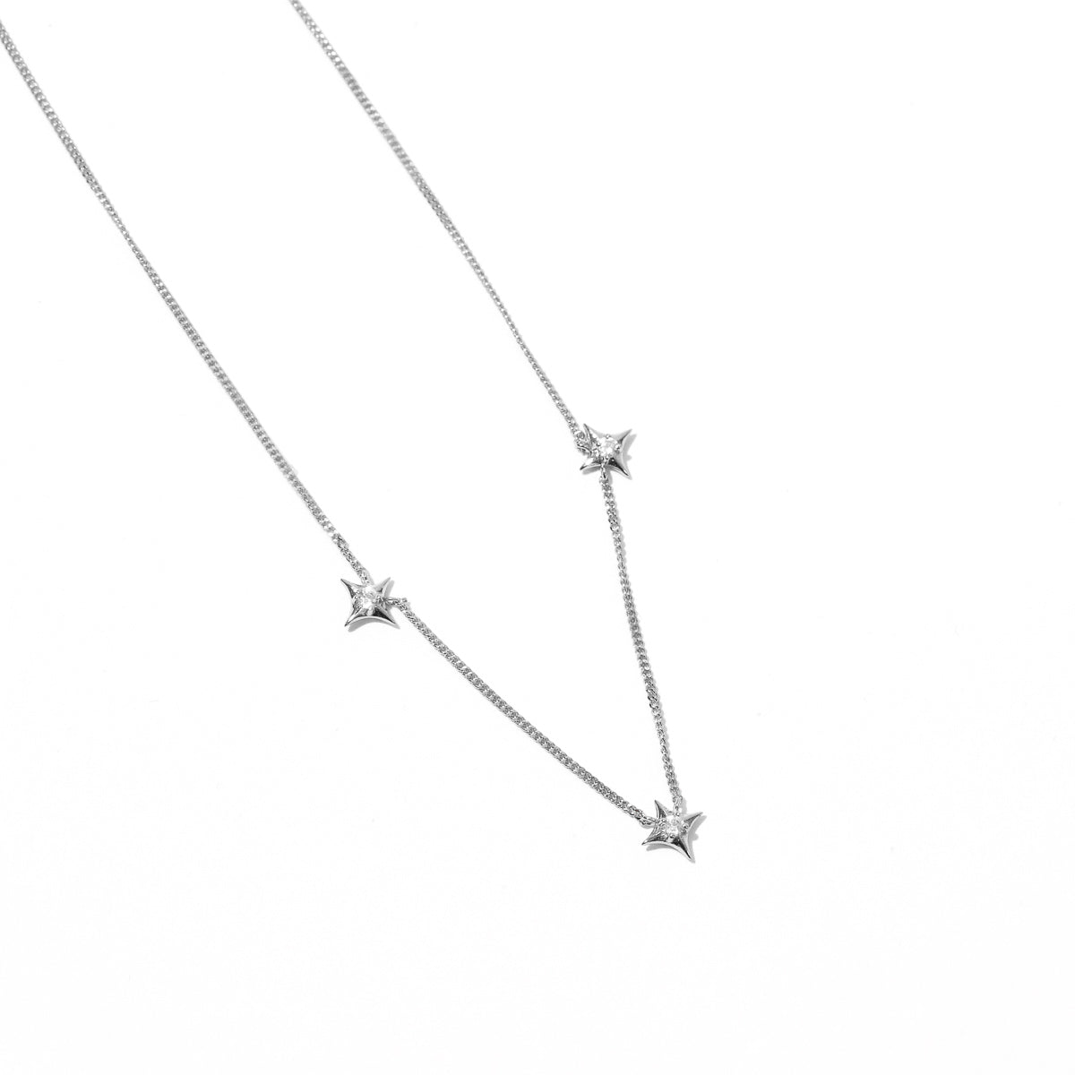 Cosmic Star Charm Necklace in Silver close up shot