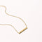 Cosmic Star Bar Necklace in Gold flat lay shot