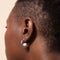 Opulent Pearl Hoops in Silver worn