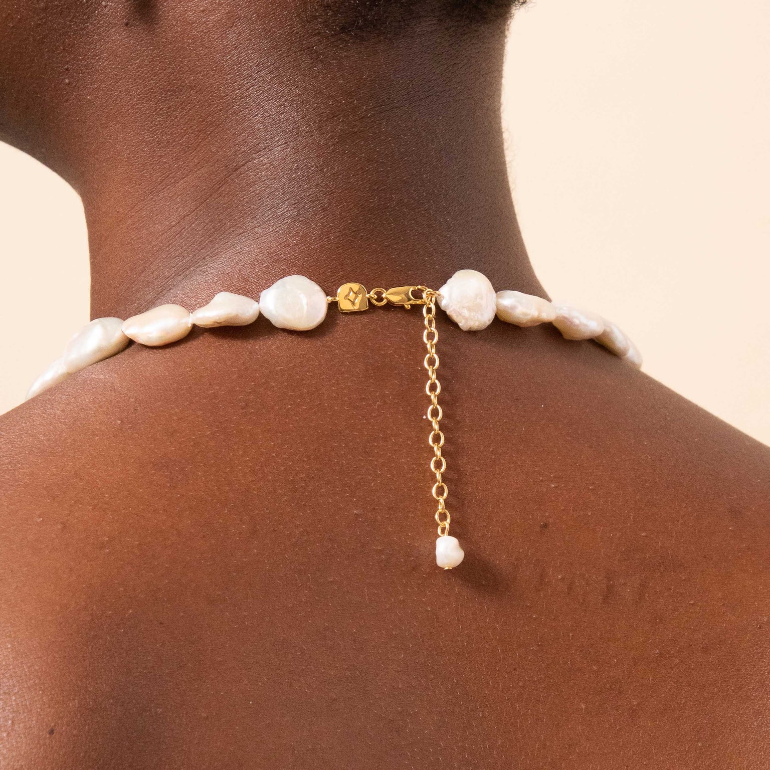 Opulent Pearl Necklace in Gold back
