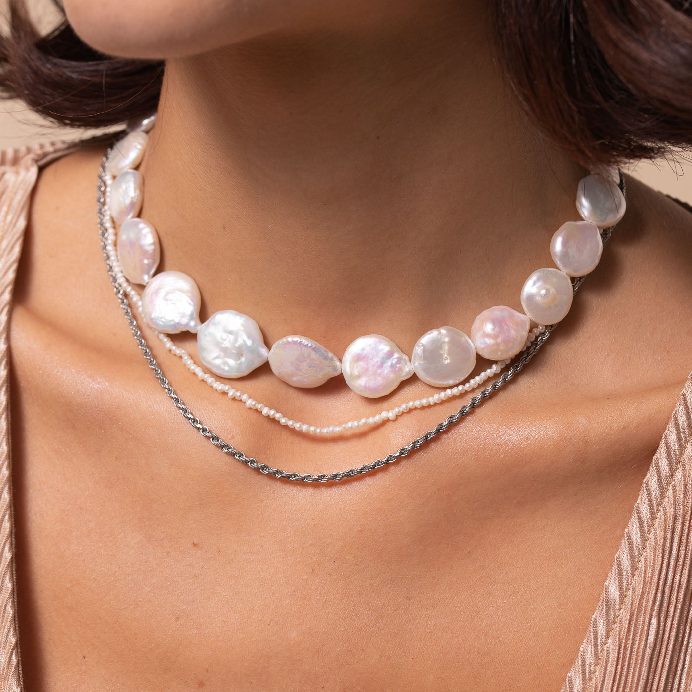 Radiant Pearl Necklace in Silver worn layered with necklaces