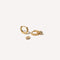 Heart Pave Charm Huggies in Gold flat lay shot