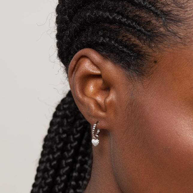 Heart Pave Charm Huggies in Silver worn