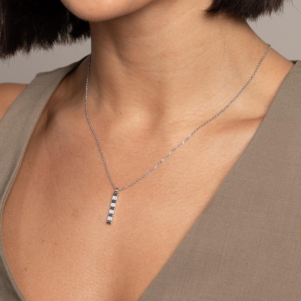 Pleated Crystal Pendant Necklace in Silver worn