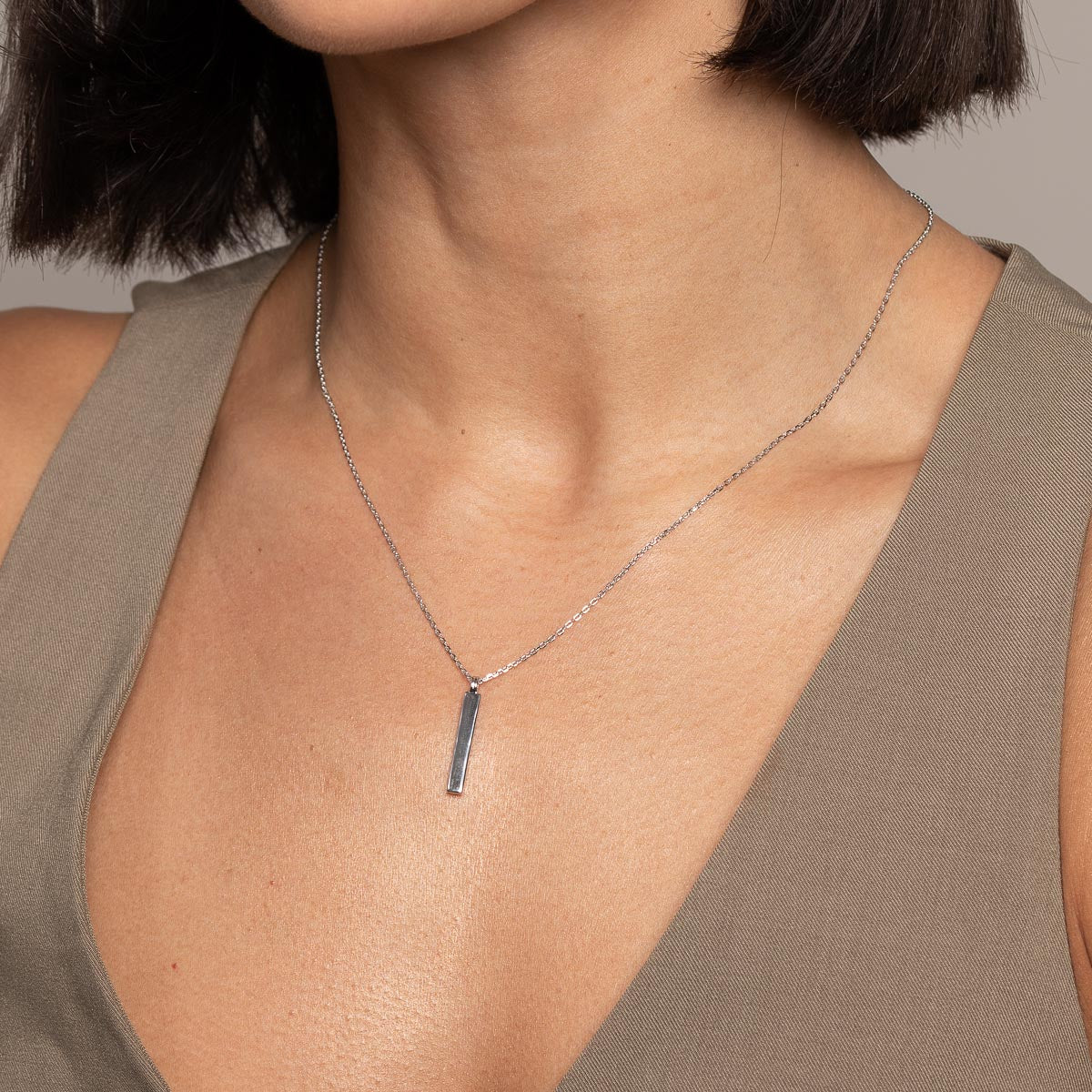 Pleated Crystal Pendant Necklace in Silver worn backwards