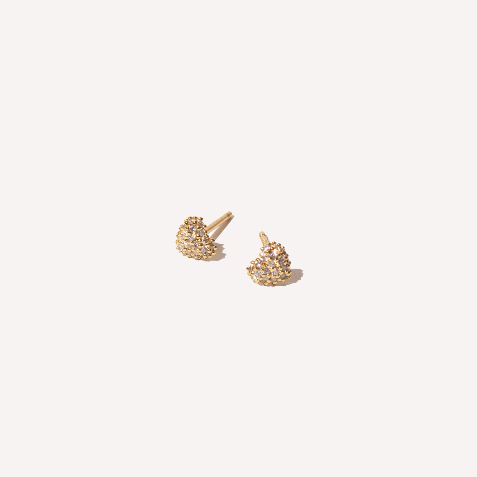Heart Pave Stud Earrings in Gold flat lay