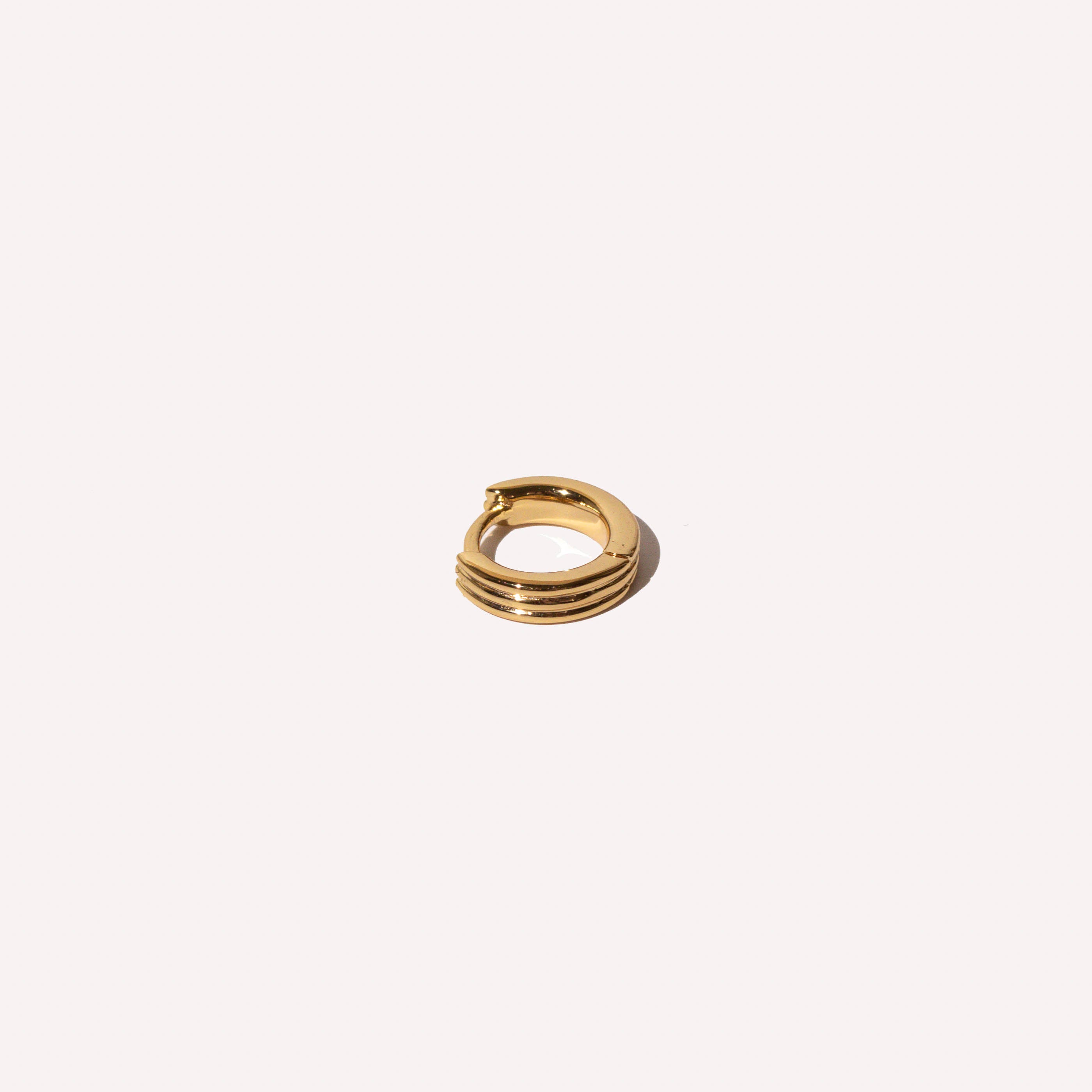 Pleated Hoop 6.5mm in Gold flat lay