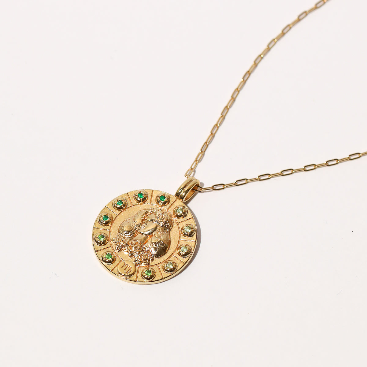 Virgo Bold Zodiac Pendant Necklace in Gold flat lay