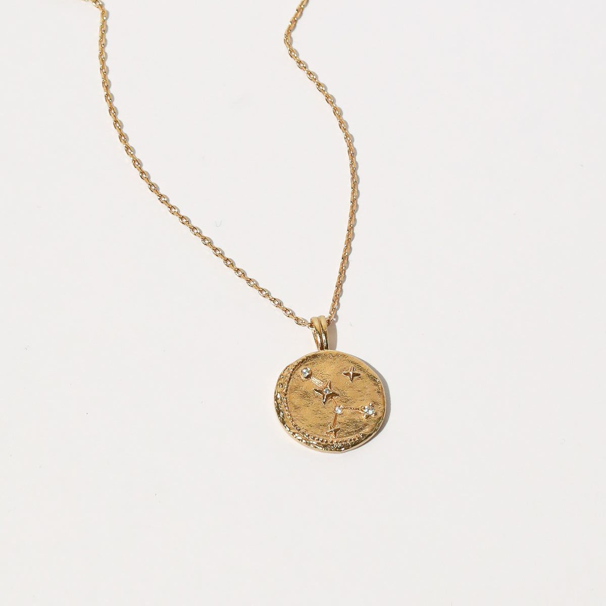 Close up shot of the front of the Cancer Zodiac Pendant Necklace in Gold