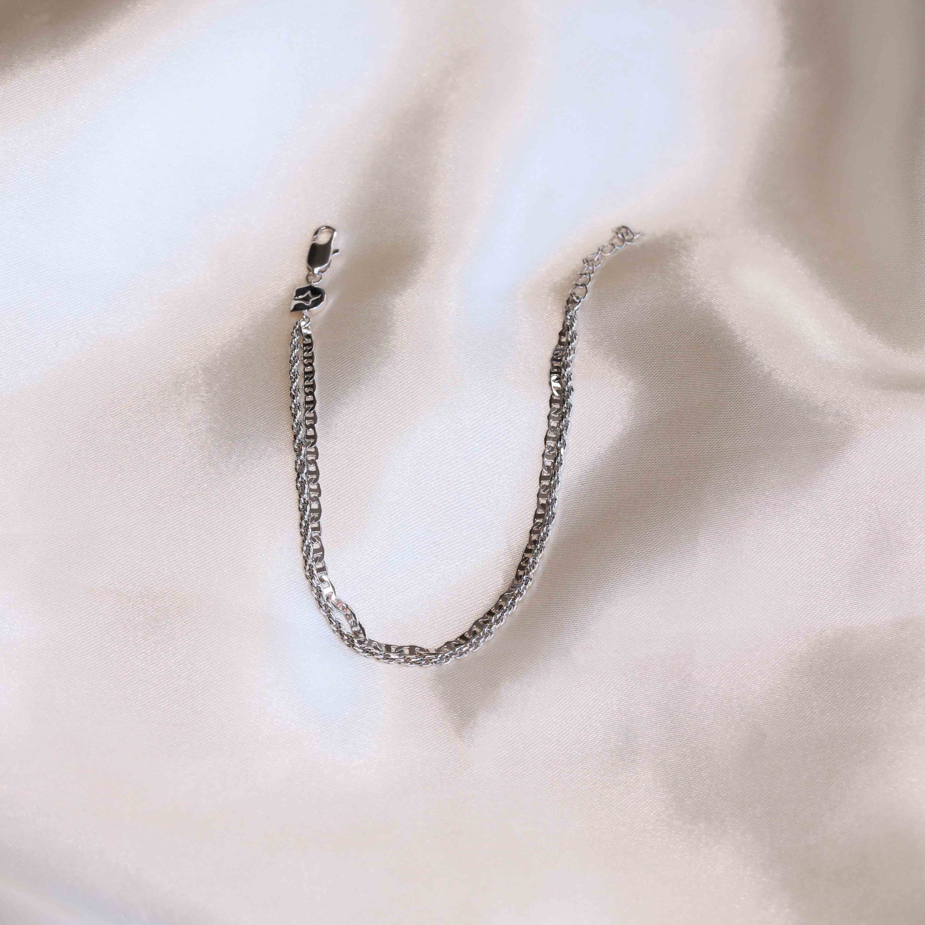 Flat lay shot of Duo Chain Bracelet in Silver