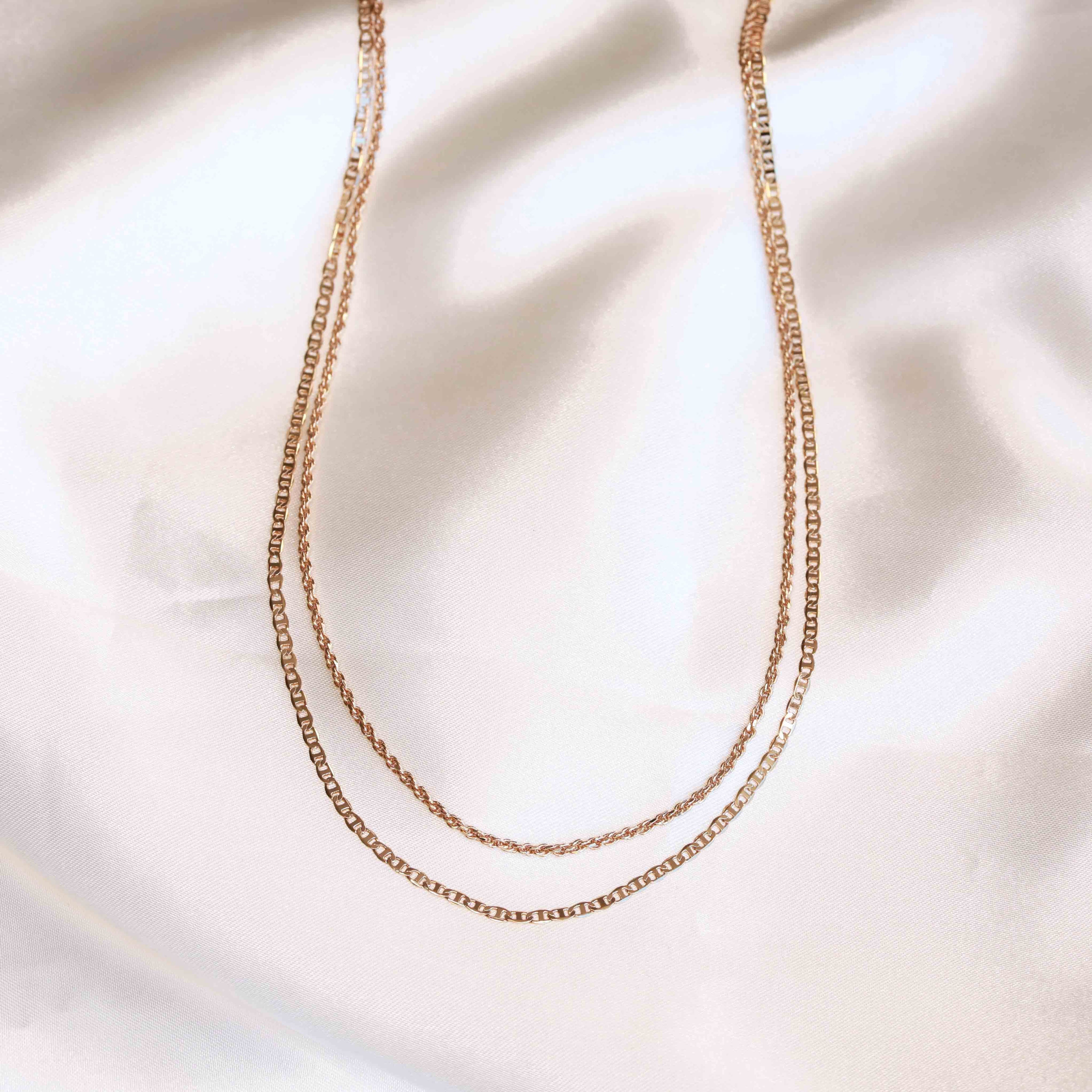 Flat lay shot of Duo Chain Necklace in Gold