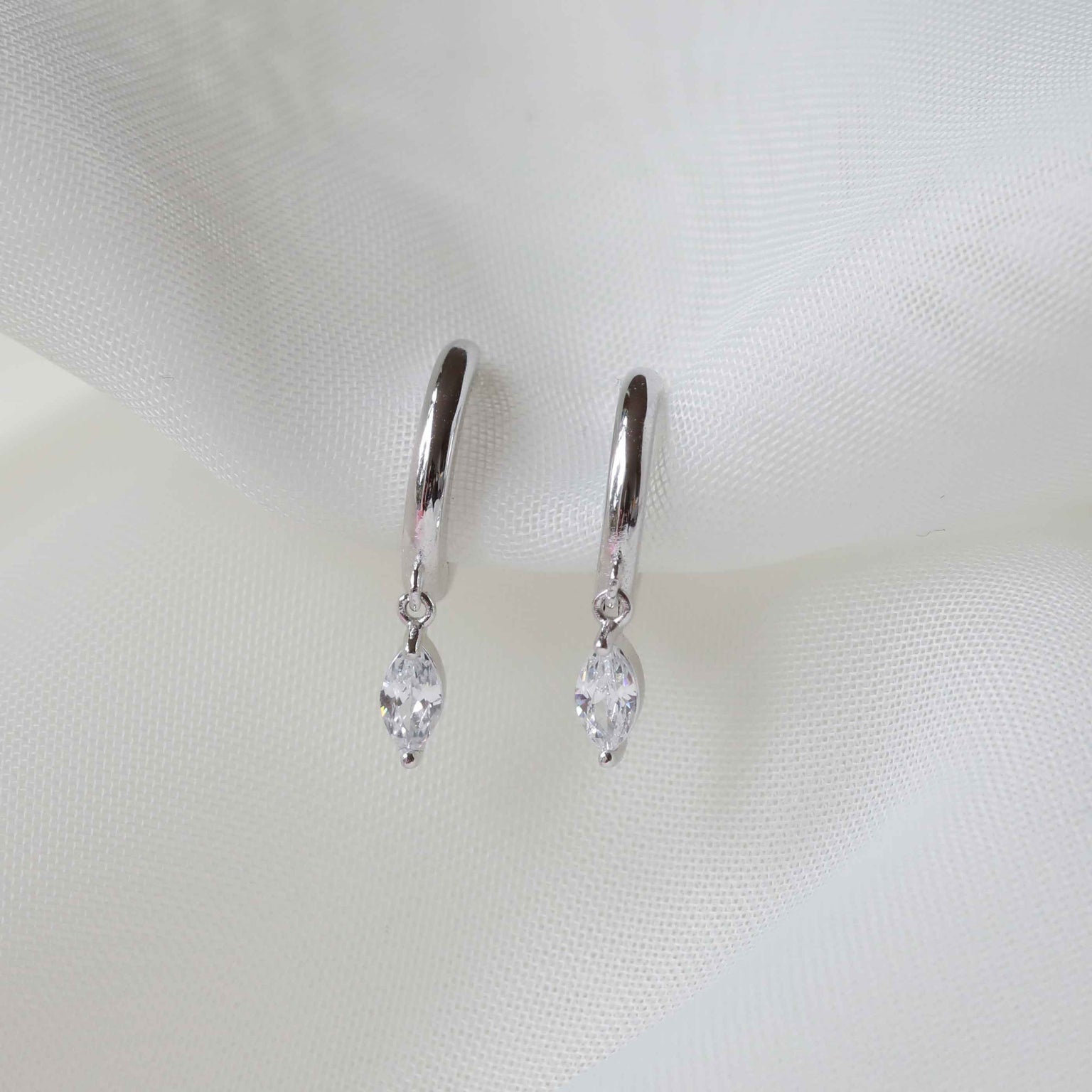 Core Collection SS23 - Navette Charm Huggies in Silver - Huggies - Astrid &amp; Miyu