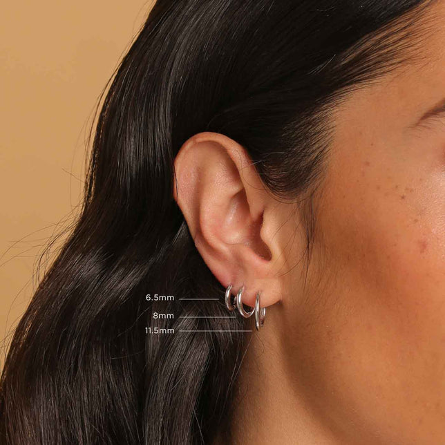 Essential 6.5mm Hoop in Silver worn with other sizes