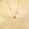 Flat lay shot of R Initial Pendant Necklace in Gold