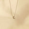 Flat lay shot of C Initial Pendant Necklace in Silver