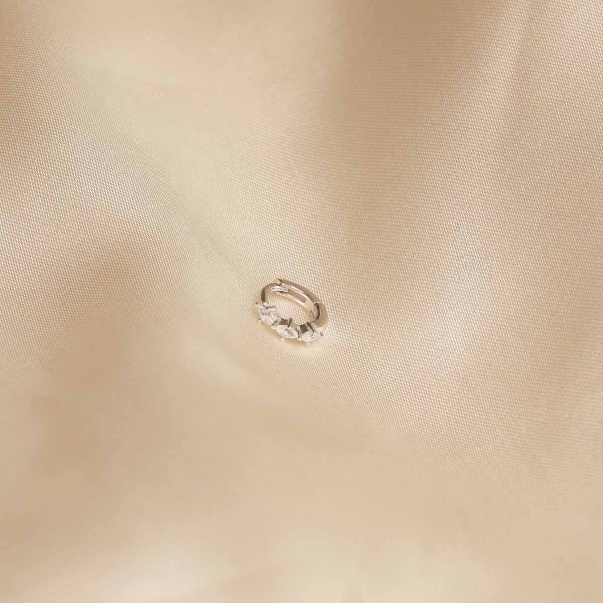 Flat lay shot of Navette Hoop 6.5mm in Silver