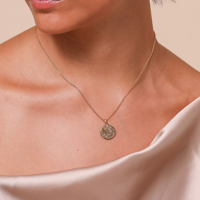 Pisces Zodiac Pendant Necklace in Gold worn