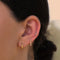 Cosmic Star Small Hoops in Gold worn