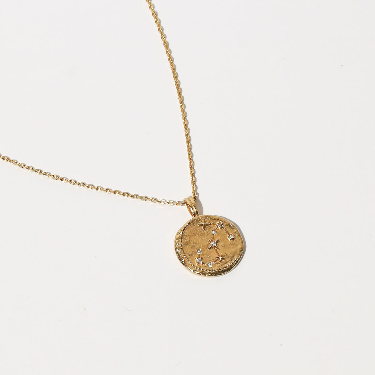Close up shot of the front of the Scorpio Zodiac Pendant Necklace in Gold