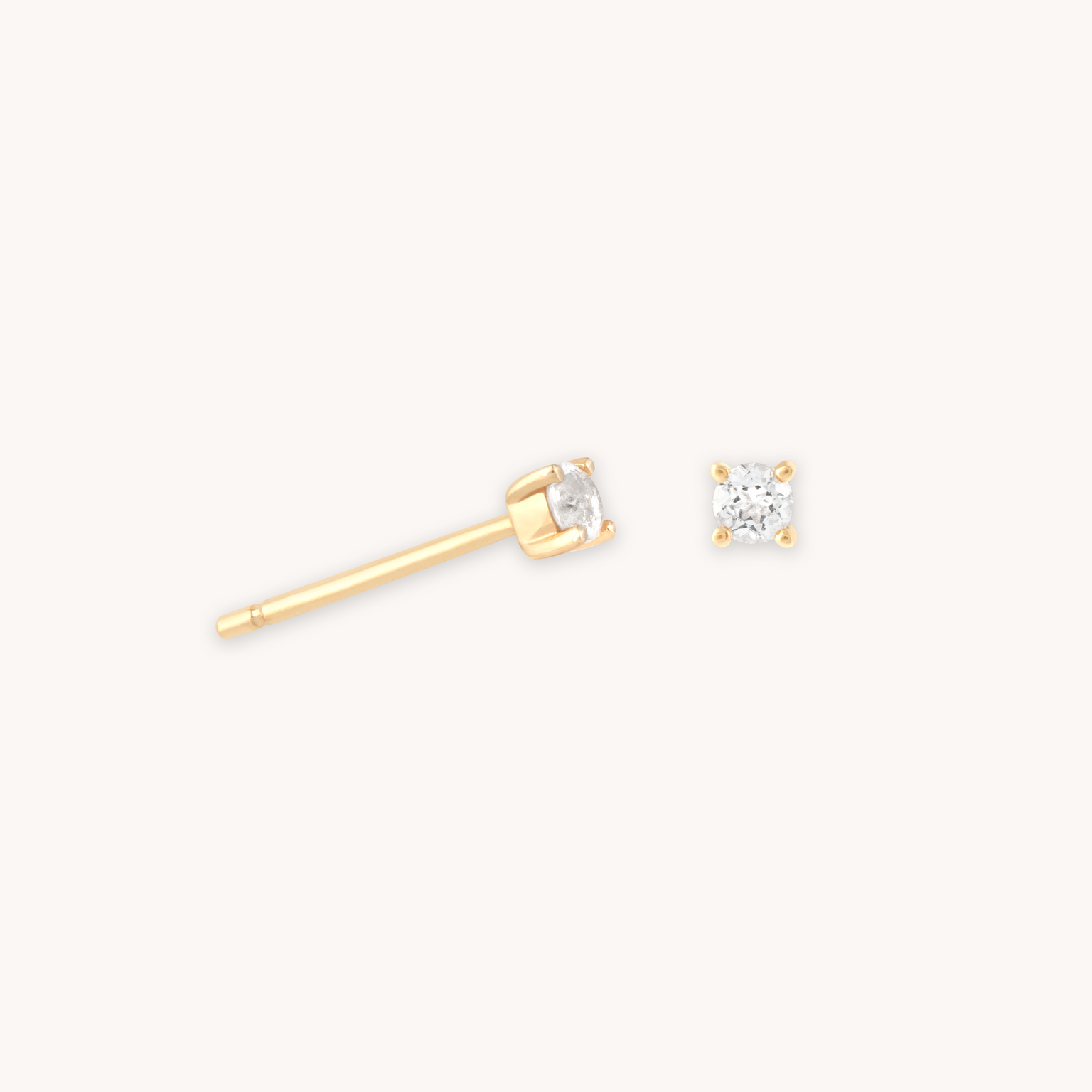 Topaz Stud Earrings in Solid Gold cut out