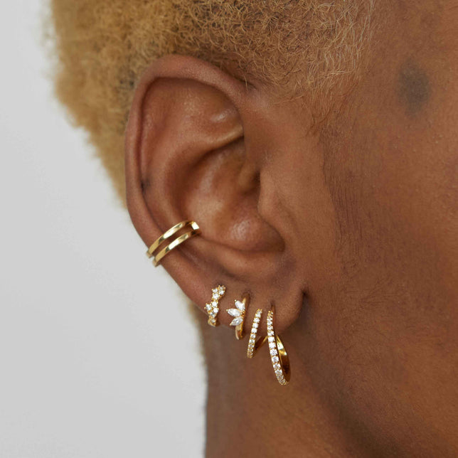 Illusion crystal hoops in gold won with gold huggies and ear cuff